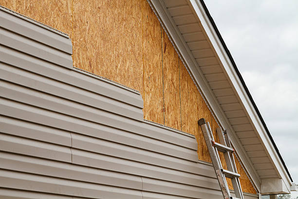 Professional Emergency Siding Repair technician working in Clinton, TN